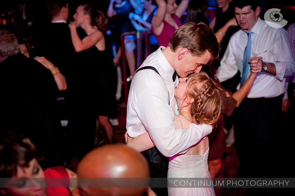 a tender moment between bride and groom on the dance floor