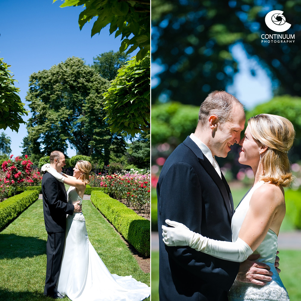 Bride and groom pose for wedding portaits at Peninsula Park Rose Garden in SE Portland.