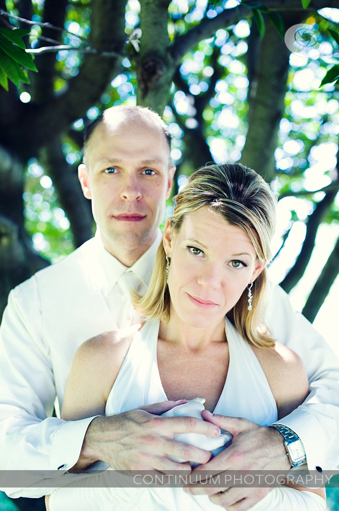Romantic photo of bride and groom taken at Mount Tabor Park.