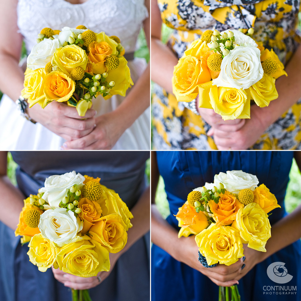 Yellow and white bridal bouquets with blue bridesmaids dresses.